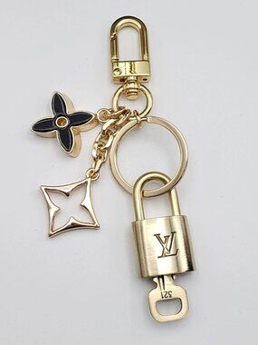 Authentic Louis Vuitton Gold Lock 🔒 Unbranded Flower Keychain Bag Charm LV